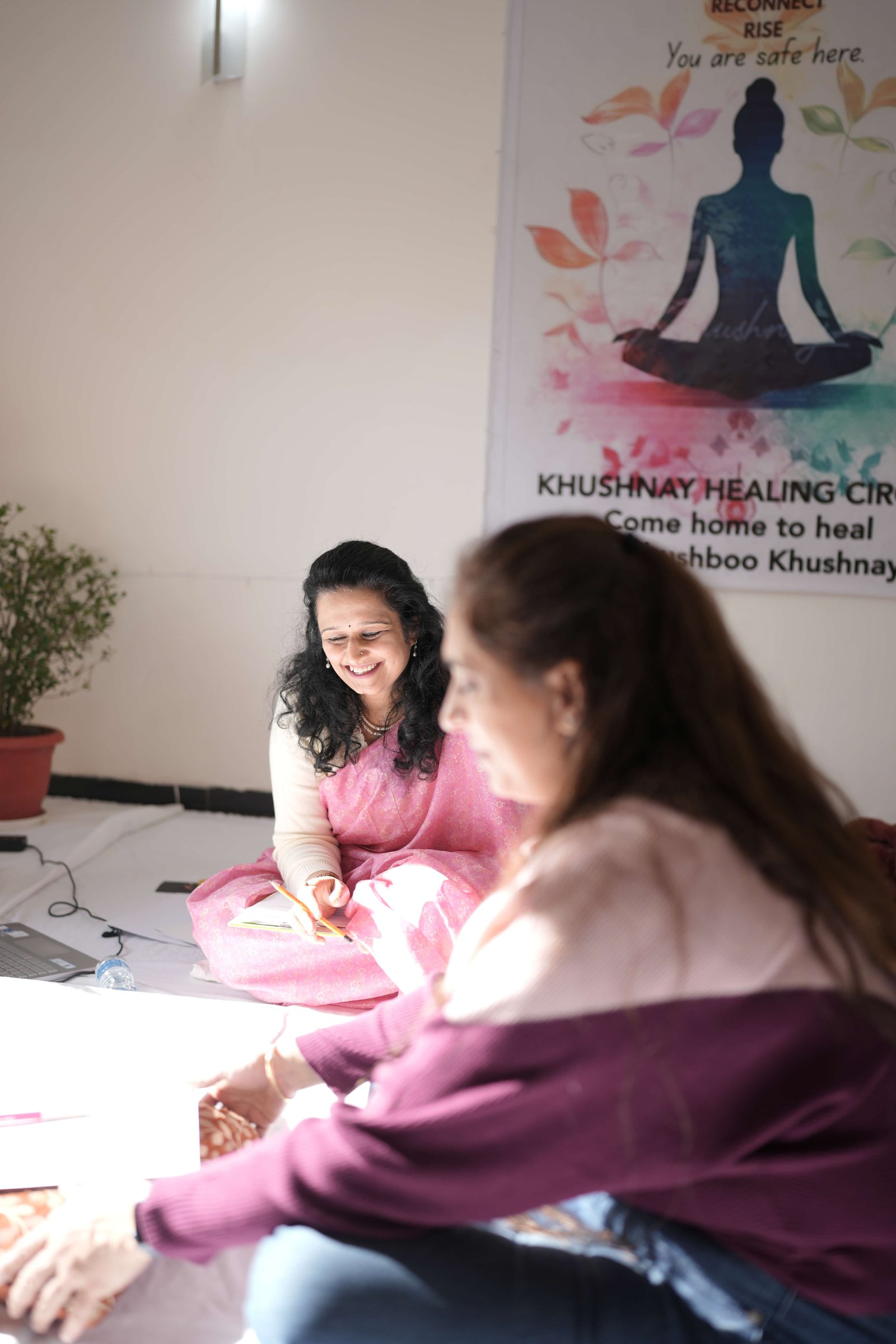 Retreat participants engaged in a guided healing session
